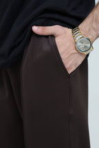 Men's premium pleated trousers by theseventhstitch, showing tailored fit and classic design in a neutral color.