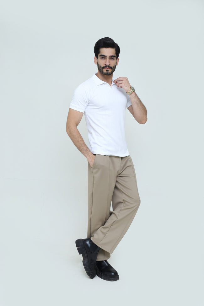 Classic white polo shirt and luxury pleated trousers set by theseventhstitch, featuring a clean, stylish look with tailored fit. Hover Image