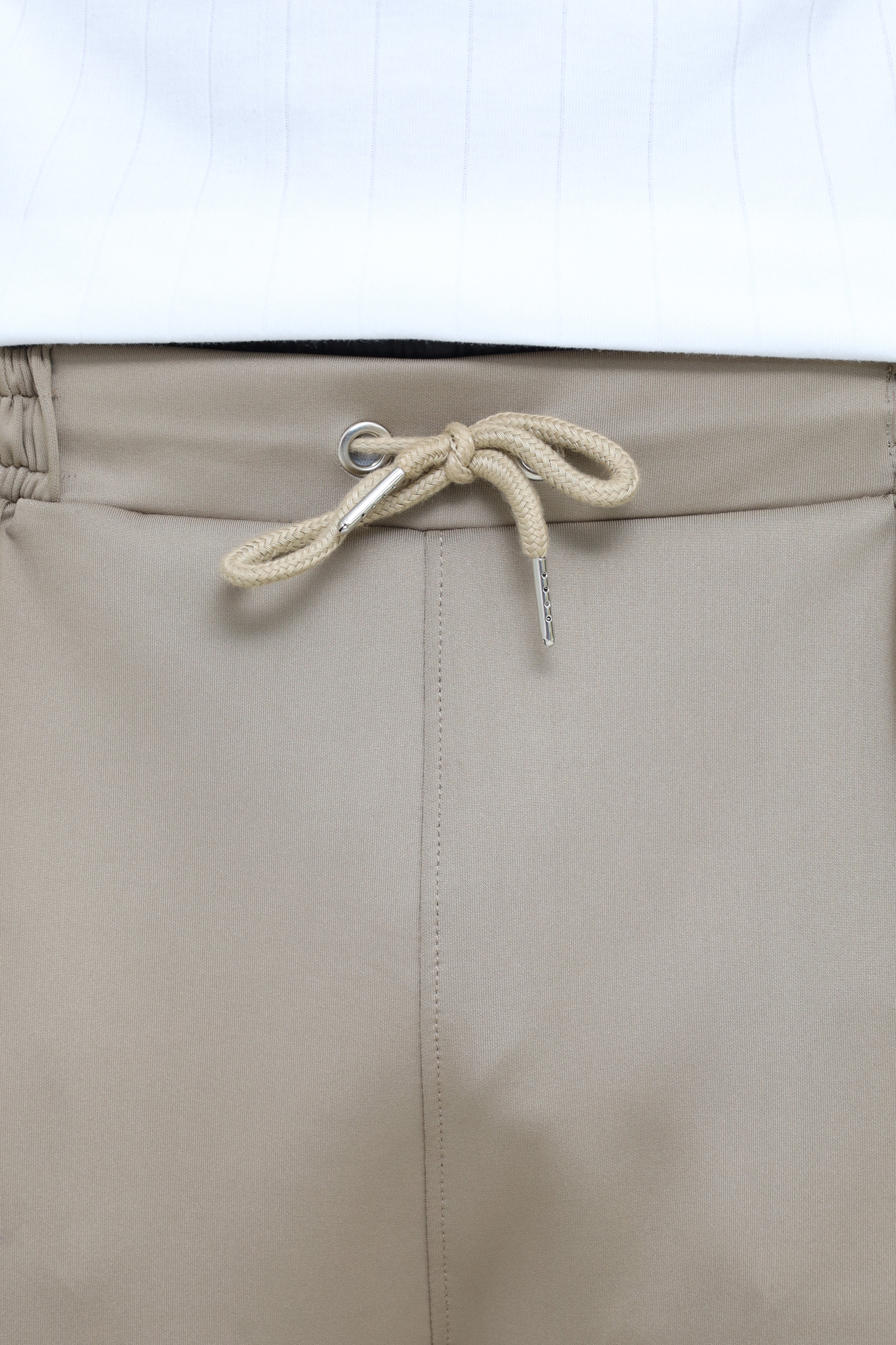 Men’s premium pleated trousers from theseventhstitch, showing a tailored fit and classic design in a neutral color.