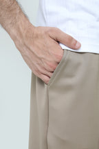 Pair of premium men's pleated trousers by theseventhstitch, showcasing the tailored fit and classic pleated design.
