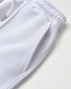 The Relaxed Pleat Trouser - White