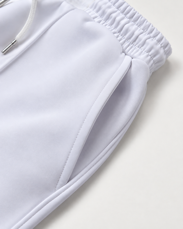 The Relaxed Pleat Trouser - White